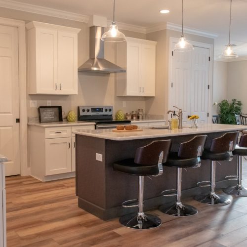 kitchen with island countertop and dining stools