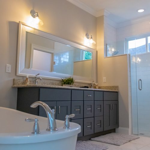 master bath with roman tub and walk in shower